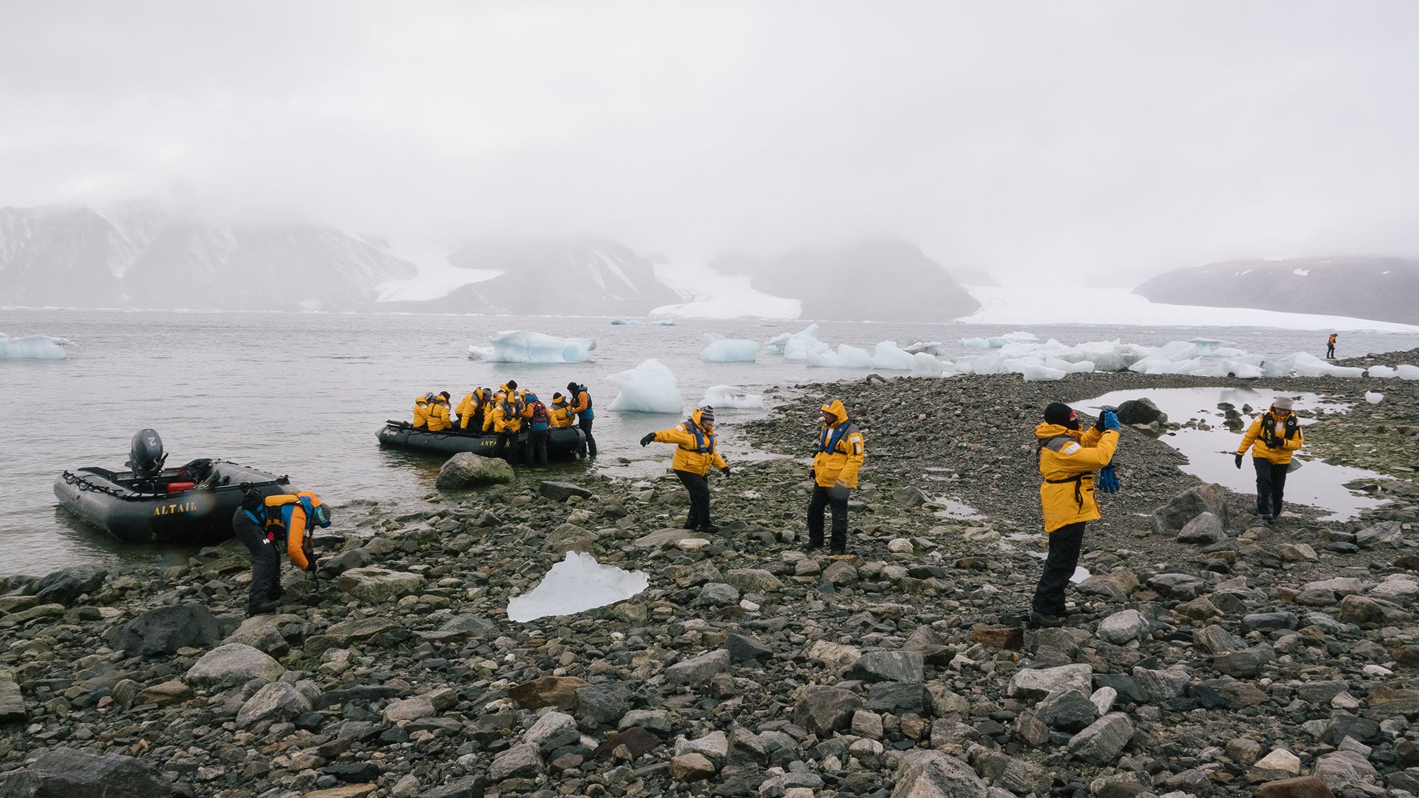 Quark Expeditions guests on a glacier landing during a voyage to Ellesmere Island.