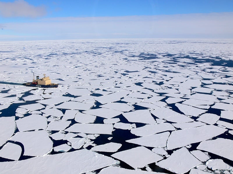 The Kapitan Khlebnikov icebreaker powers through multi-year sea ice in the Arctic.